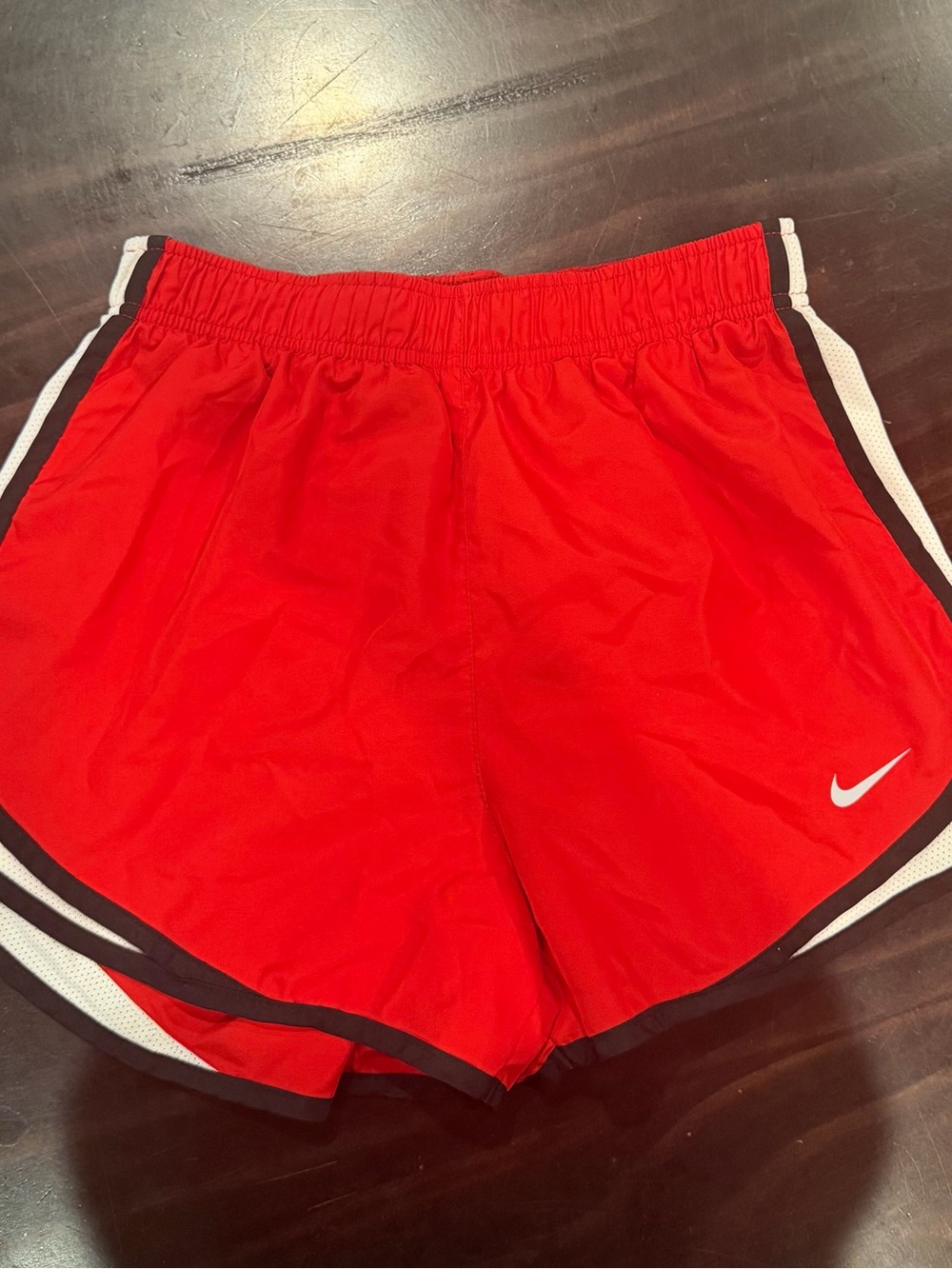 Nike Women's Red Athletic Shorts with White Swoosh